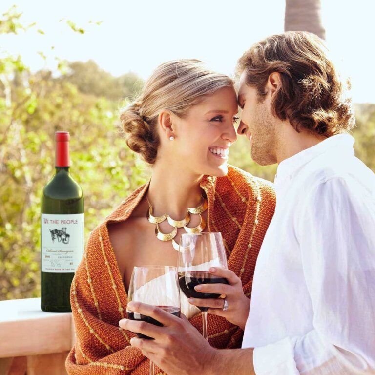 52-glamorous-caucasian-couple-drinking-red-wine-outdo-6JAC8NS-2